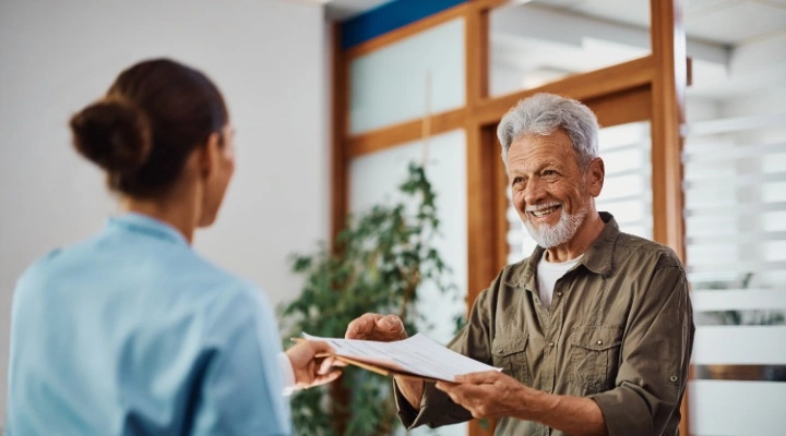 man doing insurance paperwork