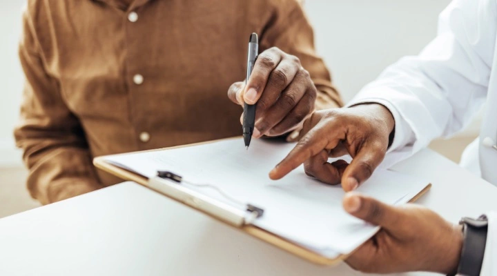 patient filling out forms
